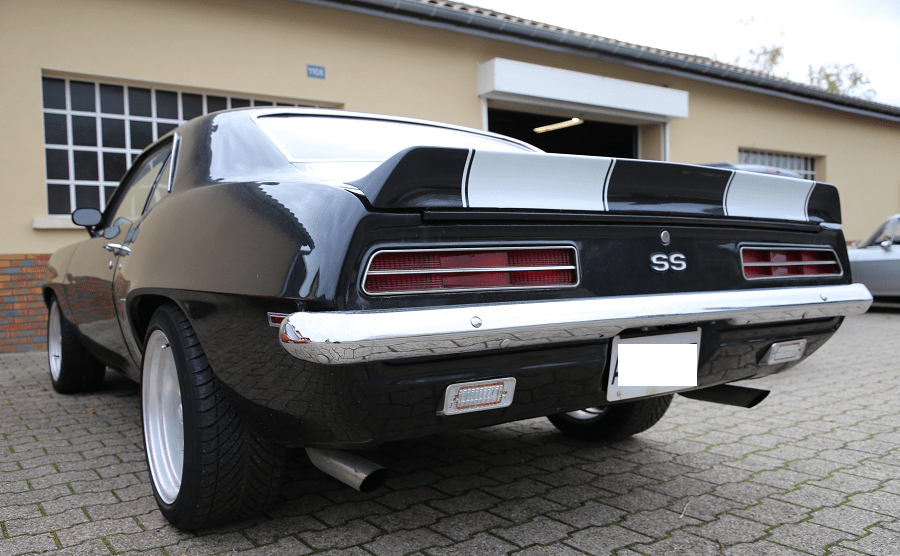Chevrolet Camaro SS 350 de 1967. Couleur noire_vue de derriere_transport_vehicules_legendaires